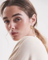 Aros tipo caravanas de alpaca con pernos y cierres mariposa de plata 925.