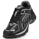 Championes Puma modelo Skyjet, color negro con detalles en gris y plateado, diseño técnico inspirado en running con estructura de malla y superposiciones sintéticas.