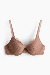 Soutien push-up color tostado, confeccionado completamente en encaje con diseño floral. Cuenta con aros, copas acolchadas, breteles ajustables y detalles de bordes scalloped en el escote y la base.
