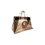 Bolso tote transparente A Bathing Ape con diseño translúcido y estampado del logo del mono de la marca junto con el texto "By Bathing Ape" en la parte inferior.