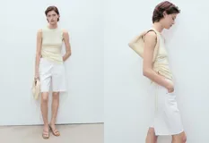 Short de jean de tiro medio con diseño recto, cinco bolsillos y bajo deshilachado.