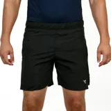 Short deportivo para hombre, color verde oscuro o negro, con cintura elástica y logo reflectante de Diadora en la parte inferior delantera.