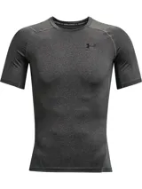 Remera de compresión de manga corta Under Armour, diseñada con tecnología HeatGear para una gestión eficiente del sudor y secado rápido. Presenta un ajuste ceñido al cuerpo, paneles de malla estratégicos para ventilación en axilas y espalda, y mangas raglán híbridas que permiten mayor libertad de movimiento.
