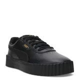 Championes Puma Carina 3.0 Animal Flair de estilo urbano, confeccionados en cuero sintético negro con suela de plataforma robusta y texturizada. Presentan el logo de la marca en dorado en el lateral y cordones al tono.