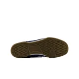 Championes de skate New Balance Numeric 600, color azul marino con detalles en celeste y suela marrón.