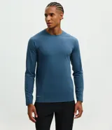 Remera térmica de manga larga Get Over, con cuello redondo y diseño de corte raglán. Confeccionada en tejido con tecnología de tacto suave, ideal para actividades deportivas o uso casual.