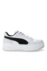 Championes Puma modelo Rebound Femme Low, color blanco, con diseño de plataforma y detalles perforados en la puntera y los laterales.