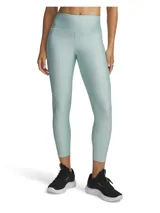 Calzas deportivas Under Armour de tiro alto, confeccionadas en tejido HeatGear ultraligero y elástico que absorbe el sudor. Presentan costuras planas ergonómicas para mayor comodidad, cintura antideslizante y bolsillo lateral.