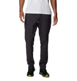 Pantalon de senderismo Columbia Tech Trail II, color gris oscuro, con tecnología de repelencia al agua Omni-Shield y protección solar UPF 50. Presenta cintura con elástico parcial, bolsillos laterales y bolsillo de seguridad con cierre.
