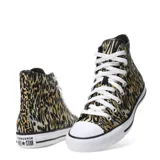 Championes Converse Chuck Taylor All Star Lift con estampado animal print en tonos negro, marrón y beige.