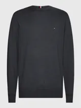 Sweater gris oscuro de punto con cuello redondo y logo de Tommy Hilfiger bordado en el pecho.