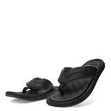 Sandalias tipo ojota para hombre, con tiras anchas de textura granulada y detalle de logo metálico circular. Presentan una plantilla ergonómica y suela con relieve antideslizante.