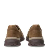 Zapatos tipo slip-on Caterpillar, confeccionados en lona color beige, con suela de goma robusta en tono marrón y detalle de marca en el lateral.