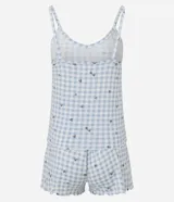 Conjunto de pijama short doll de punto, estampado de cuadros vichy celestes y blancos con mini corazones negros. Incluye un top de breteles finos con escote en V y un short con cintura elástica.