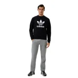 Buzo Adidas negro con logo Trefoil blanco estampado en el frente.