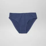 Pack de siete bombachas de corte clásico, confeccionadas en algodón liso en una variedad de colores pasteles y neutros, incluyendo amarillo, blanco, azul marino, rosado, lila, terracota y celeste.