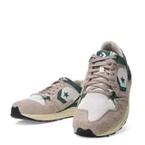 Championes Converse Wave Trainer OX unisex. Capellada de malla y gamuza color beige con detalles en verde y cordones marrones. Mediasuela con espuma CX y plantilla de memory foam.