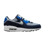 Championes Nike Air Max 90 SE, con diseño clásico de running. Presentan una combinación de colores en azul marino, gris y detalles en azul brillante, con suela blanca y unidad de aire visible en el talón.