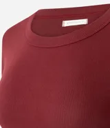 Blusa básica de manga larga Marfinno, color beige, confeccionada en tejido acanalado con cuello redondo y diseño ajustado.