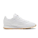 Championes Reebok Classic Leather blancos con suela de goma color caramelo.