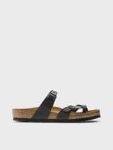 Sandalias negras de mujer, modelo Mayari, con tira de dedo y dos tiras ajustables con hebillas metálicas. La plantilla es anatómica de corcho-látex y la suela es de EVA.