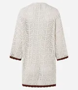 Kimono largo de punto calado color crudo con terminaciones en marrón. Tiene cuello en V y mangas 3/4.