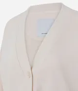 Cardigan de algodón color beige con escote en V, cierre frontal con botones y puños y cintura acanalados.