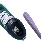 Championes de media caña Vans Skate Half Cab, color verde con detalles en azul marino y cordones blancos.