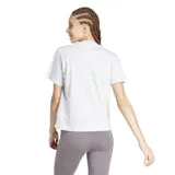 Remera de algodón con cuello redondo y mangas cortas, en color gris jaspeado. Presenta un diseño minimalista con el logo de Adidas bordado en el centro del pecho.