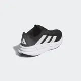 Championes de running Adidas Adistar 3, color negro con tres franjas laterales blancas. Presentan una entresuela gruesa blanca con diseño texturizado y suela negra.