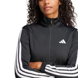 Campera deportiva Adidas de mujer, confeccionada en tejido tricot de poliéster. Presenta un diseño clásico en color negro con cuello alto, cierre frontal completo y las icónicas tres tiras blancas en las mangas. Incluye bolsillos laterales y puños elásticos.