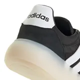 Championes urbanos Adidas Barreda Decode, color negro con las tres tiras características en blanco y suela translúcida de estilo chunky.