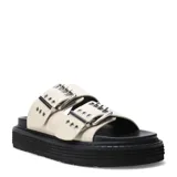 Sandalias de plataforma plana Miss Carol modelo Mavic, color negro, de estilo chunky con dos tiras anchas en el empeine decoradas con hebillas metálicas y ojales plateados.