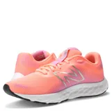 Championes New Balance Running Course, color coral rosado con detalles en lila y logo "N" en el lateral.