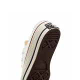 Championes Converse Chuck 70 Mule blancos, con cordones y suela de goma con detalles en rojo y azul.