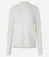 Suéter verde oscuro de punto con cuello alto y mangas largas.