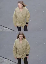 Parka oversize de algodón color verde militar, con cuello en pico, solapas con muesca, manga larga, bolsillos delanteros con solapa y cinturón ajustable del mismo tejido.