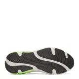 Championes de running Under Armour modelo Rogue 6, color negro con detalles en verde neón y entresuela blanca. Presentan diseño de malla transpirable, cierre con cordones y logo de la marca en el lateral.