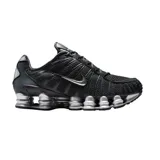 Championes Nike Shox TL color negro con detalles plateados, capellada de malla transpirable, estructura de TPU para mayor soporte y columnas de amortiguación mecánica.