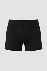 Boxer de hombre color negro, con pretina elástica ancha que lleva la marca "LUXO" en relieve.