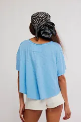 Remera corta de corte relajado y silueta holgada de la colección We The Free, confeccionada en una mezcla de lino y algodón con acabado jaspeado y cuello redondo.