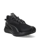 Championes de trail running Puma modelo Extend Lite, color negro con detalles en gris. Presentan una estructura de malla transpirable con refuerzos sintéticos, cordones con detalles reflectantes y una suela robusta diseñada para terrenos irregulares.