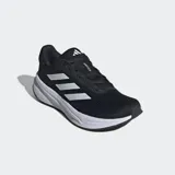 Championes de running Adidas modelo Response, color negro con las icónicas tres tiras laterales en blanco. Cuentan con una parte superior de malla transpirable, mediasuela de EVA para amortiguación y suela de caucho de gran agarre.