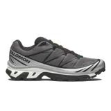 Championes Salomon XT-6, calzado de trail running adaptado para uso urbano. Diseño en color negro, gris, rojo y blanco, con sistema de cordones de ajuste rápido Quicklace y suela de gran tracción.