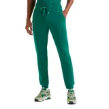 Pantalón deportivo de corte ajustado, color verde, con cintura elástica con cordón de ajuste y puños acanalados en los tobillos.