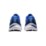 Championes de running Asics Gel-Kayano 29, color negro con detalles en rojo y amarillo. Presentan tecnología FF Blast+ en la entresuela para mayor amortiguación y diseño de malla transpirable.