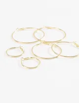 Set de aros dorados de diferentes tamaños.