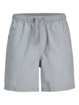 Short de sarga con calce relajado, color gris, con cintura elástica y cordón de ajuste.