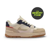 Championes deportivos de estilo urbano con diseño de paneles en tonos beige, crema y detalles en azul marino y rojo. Presentan una suela de goma color caramelo y tecnología de plantilla Memory Foam para mayor confort.