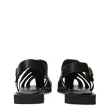 Sandalias franciscanas de cuero negro con tiras cruzadas, suela plana y hebilla metálica dorada lateral.